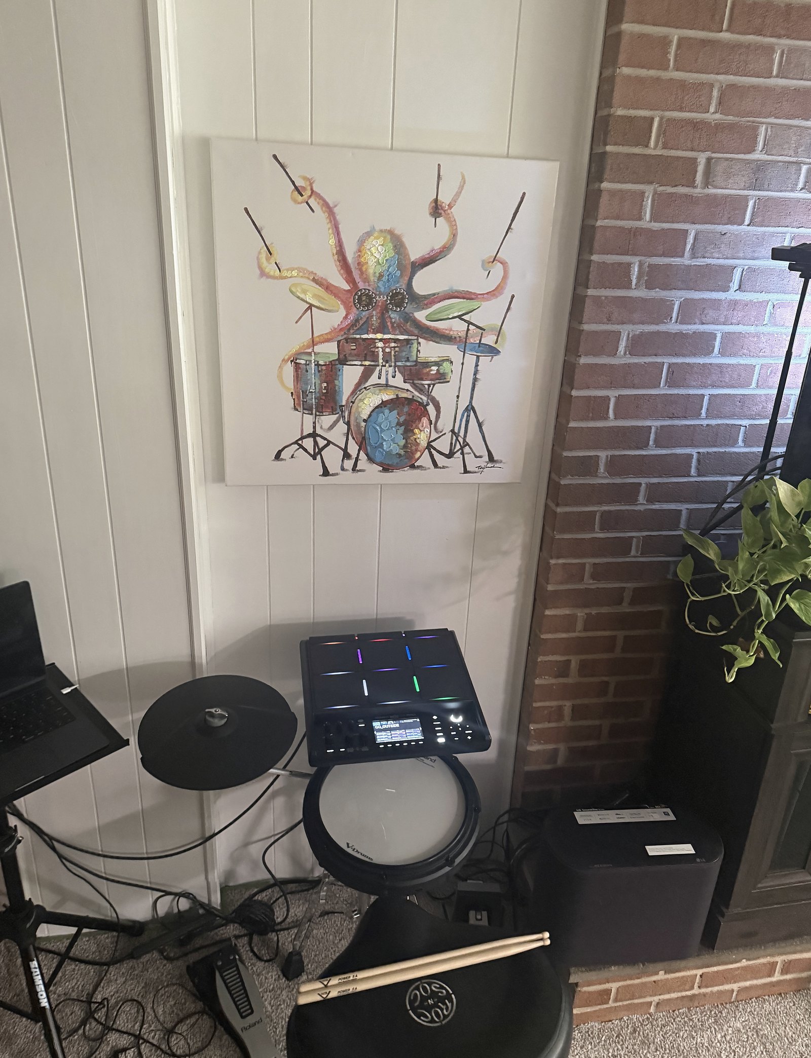 Roland SPD-SX Pro set up and playable on the porch — the hybrid layer in a real room